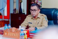 Foto: Bupati Boltara, Dr. Sirajudin Lasena, SE., M.Ec.Dev.